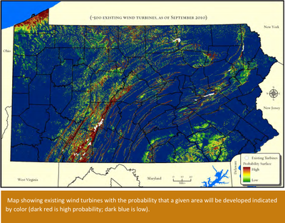 Map showing existing wind turbines with the probability that a given area will be developed indicated by color (dark red is high probability; dark blue is low).